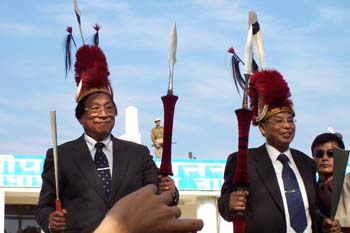 NSCN (IM) Chairman Isak Chishi Swu (right) and General Secretary Th Muivah in Naga head gears and spears during brief public reception program held in Nagaland's Dimapur Airport on December 14, 2004 